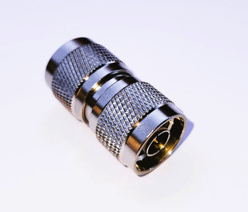 n-type plug to plug adapter